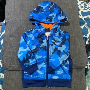 Nike hoodie for little one.